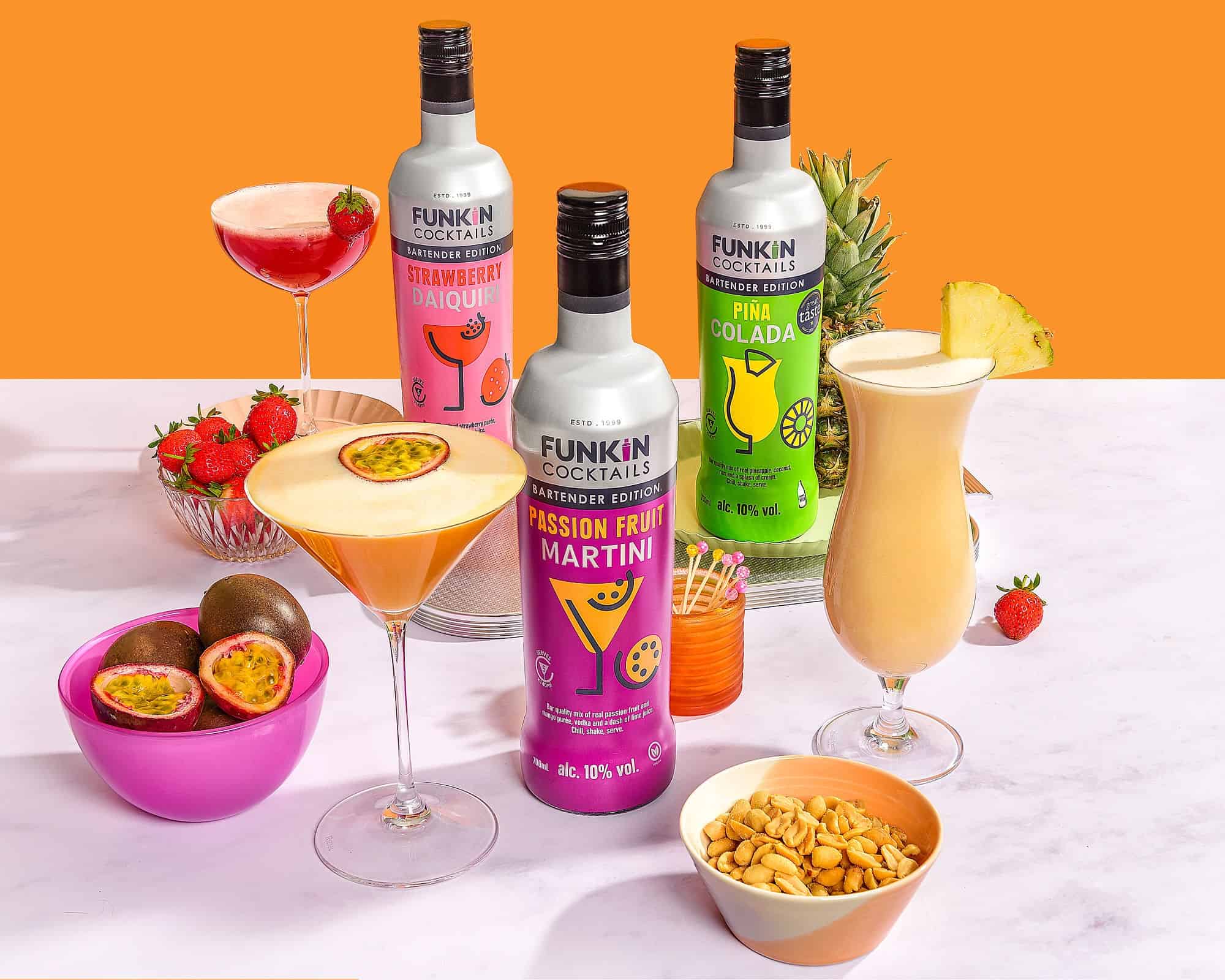 Image shows FUNKIN Cocktail pre-mixed syrups and ready-to-drink mixes.